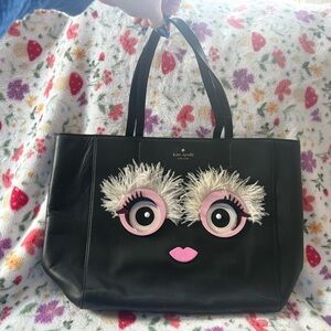 Kate Spade Black Tote with Pink Eye Design